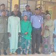 Officers of the Nigeria Police Force and family members of deceased officers after the presentation of cheques to the families [NAN]