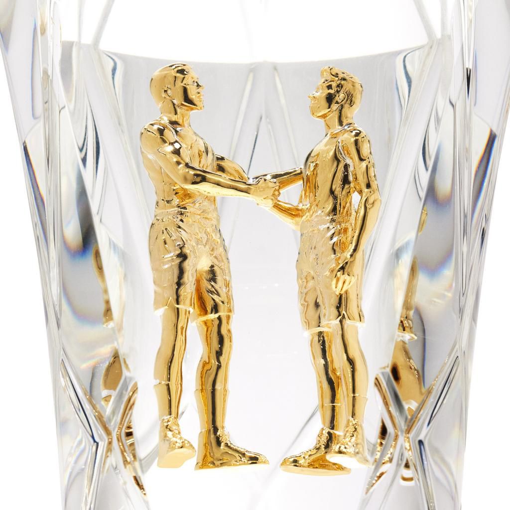 Named for the first winner of the NBA Sportsmanship Award in 1995-96, the Joe Dumars Trophy features two players shaking hands in respect for each other.