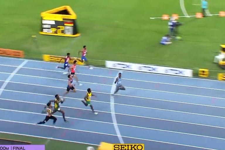 Tebogo celebrating in the final about 30m to the finish line