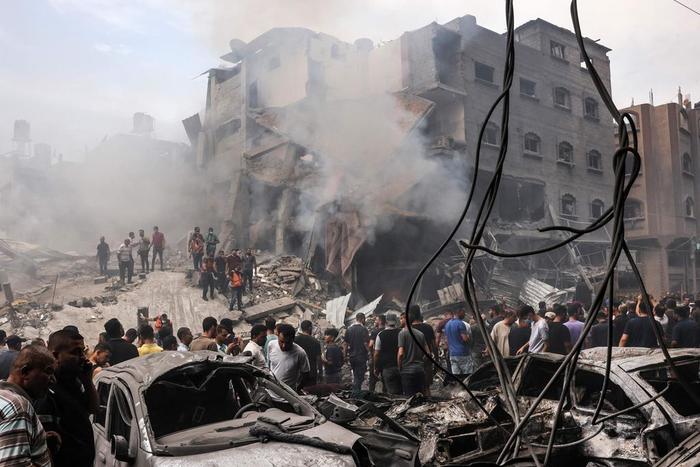 An Israeli airstrike hit a refugee camp in Gaza, destroying a busy shopping center as well as surrounding buildings and cars.