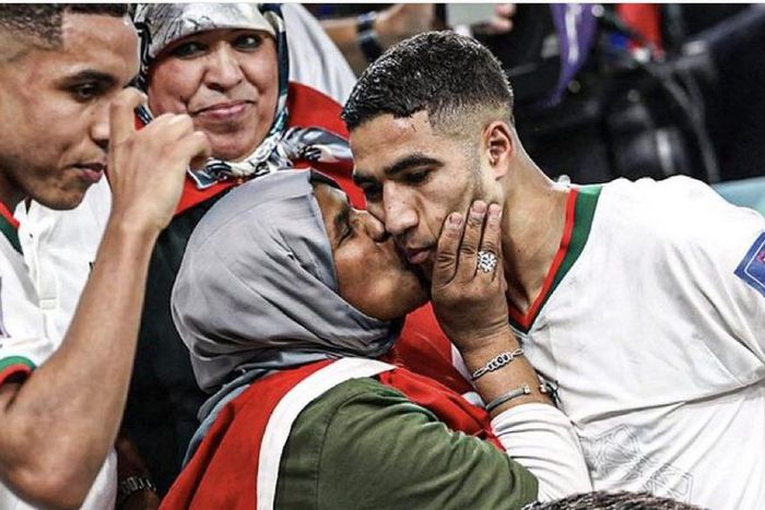 Hakimi gets a special kiss from his mother.