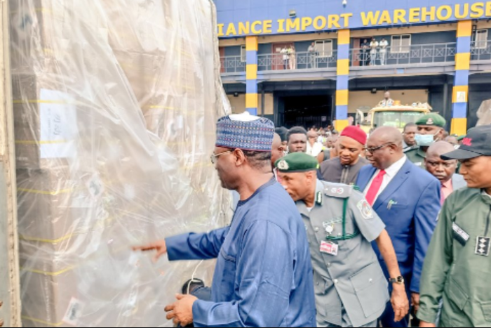 INEC Chairman, Prof Mahmood Yakubu (2nd right) inspecting the last consignment of Bimodal Voter Accreditation System (BVAS)  machines at the Nnamdi Azikikwe International Airport, Abuja on Tuesday, Jan. 3, 2023.