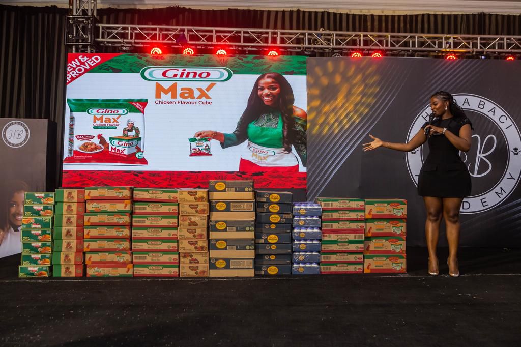GBfoods awards a winner at the My Food By Hilda Prize Giving ceremony with a one year supply of two of its flagship brands, Gino and Bama Mayonnaise.