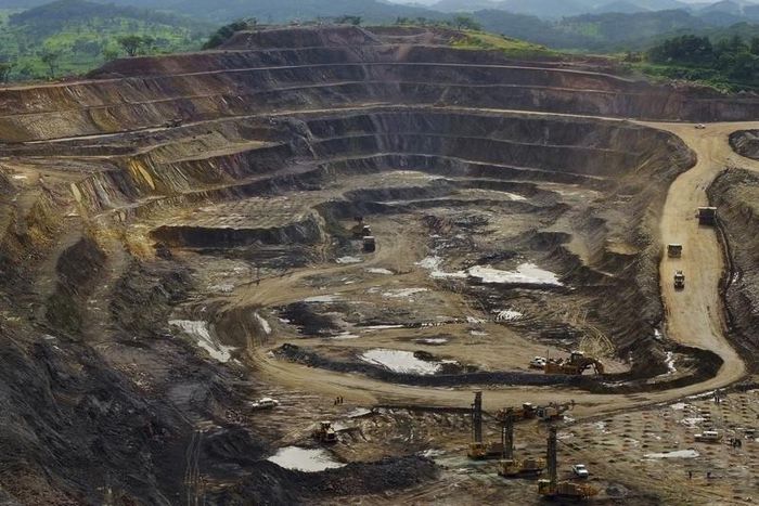 Excavators and drillers at work in an open pit at Tenke Fungurume, a copper and cobalt mine 110 km (68 miles) northwest of Lubumbashi in Congo's copper-producing south, owned by miner Freeport McMoRan, Lundin Mining and state mining company Gecamines, ...