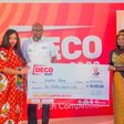 Presentation of the 2 million naira cheque to the winner of the DECO 2022 start-up prize, Ms Josephine Akpan.