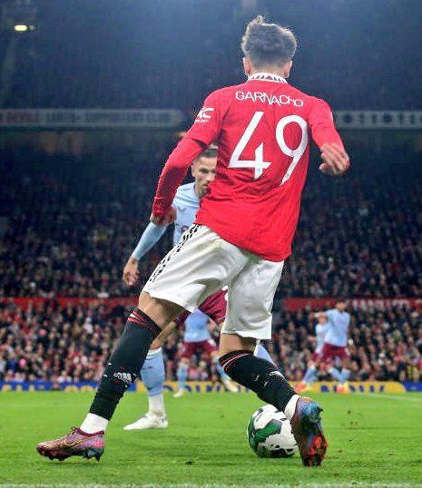 Garnacho in action for Manchester United against Aston Villa in the EFL cup
