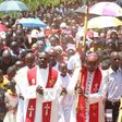 Nyeri Catholic Archbishop Antony Muheria carries a cross as led other faithful in a religious procession to Our Lady of Constanta Cathedral in Nyeri during a past event