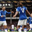 Alex Iwobi celebrates with Dwight McNeil after providing him with a nice pass inside the box to score Everton's third goal against Crystal Palace