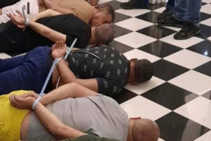 Police arrest a wanted Israeli fugitive, allegedly linked to the Abergil’s notorious crime syndicate, along with seven others at a house in Bryanston, South Africa, November 17, 2022