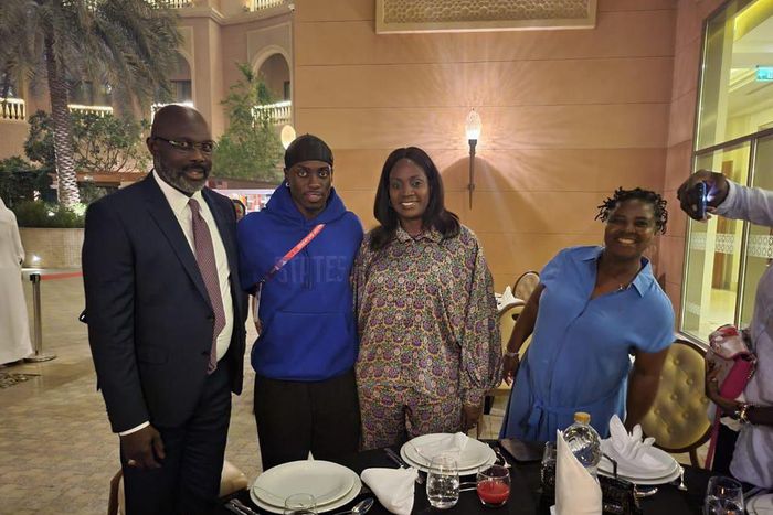 President George Weah of Liberia with his son Timothy and rest of his family