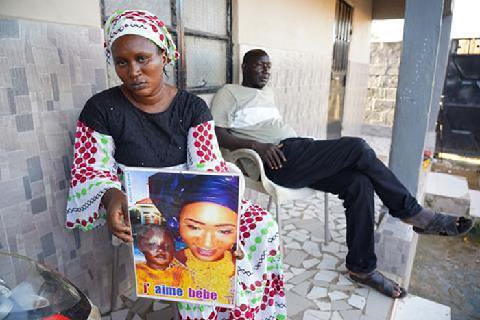 Gambian mother mourns her child