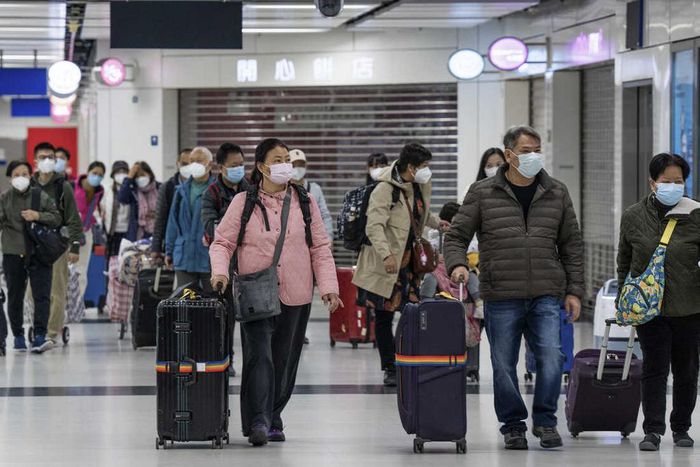 China reopens borders to all travellers (NPR)