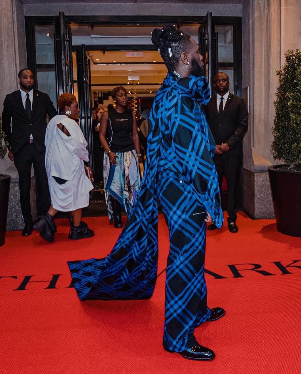 Burna Boy's outfit at the Met Gala has received praise from both fashion enthusiasts and fans, with many applauding his bold and stylish choice of attire.  [Yabaleftonline]