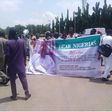 Pro-Tinubu-protesters in Abuja protesting in support of fuel subsidy removal. [Punch]