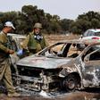 Israel soldiers inspect burnt cars at the site of the Hamas terrorist attacks on the Nova music festival in southern Israel.Amir Cohen/Reuters