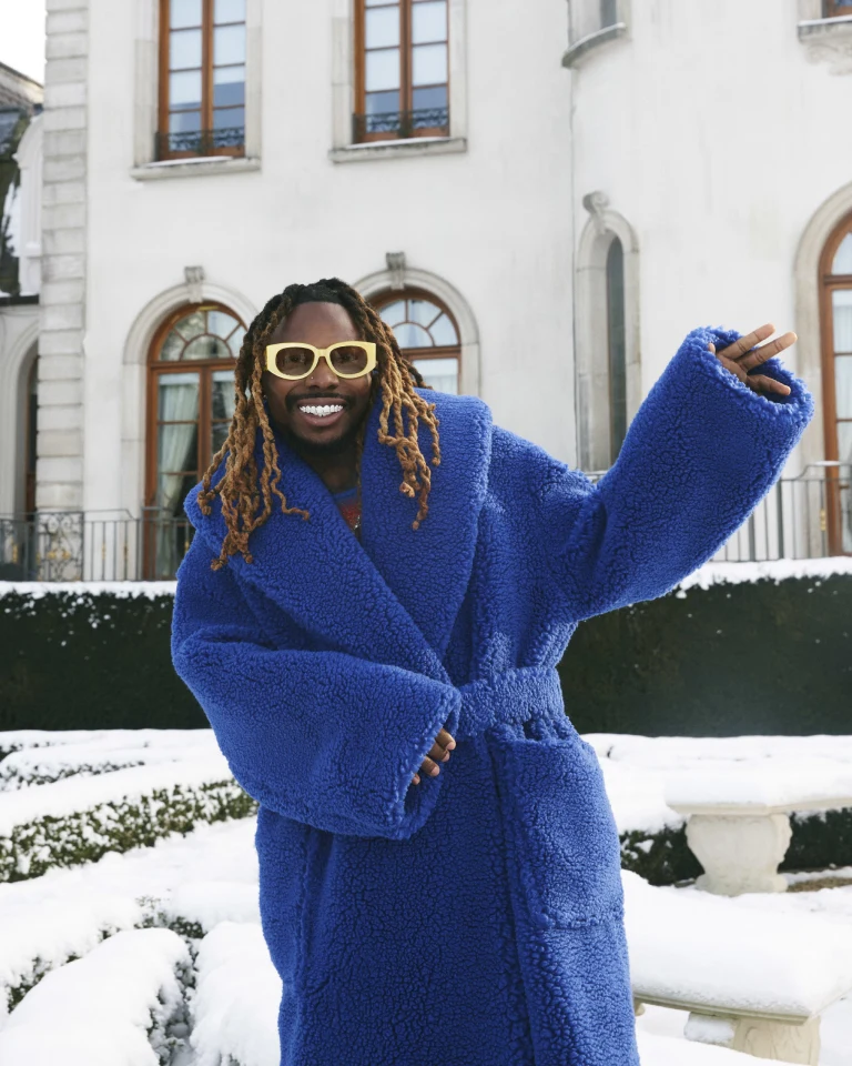 Asake in a blue Casablanca robe [Ssense]