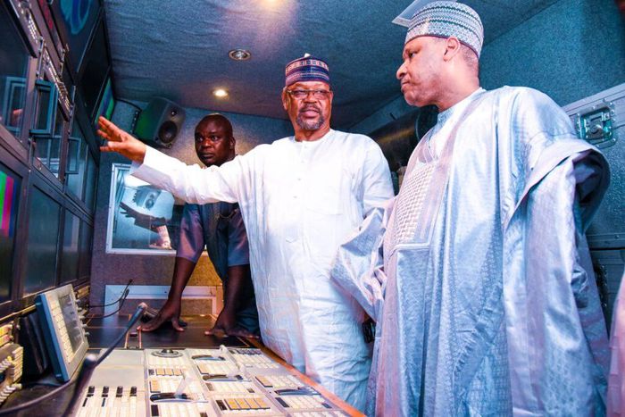 Minister of Information and National Orientation, Alhaji Mohammed Idris (second left) with Mr Salihu Dembos, DG, NTA, inspecting facilities at a transmitter Station in Jaji, Kaduna, on Friday