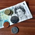British pound surges to 12-month high to defy expectations