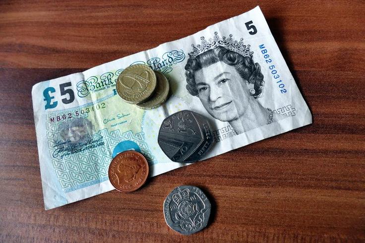 British pound surges to 12-month high to defy expectations