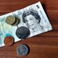 British pound surges to 12-month high to defy expectations