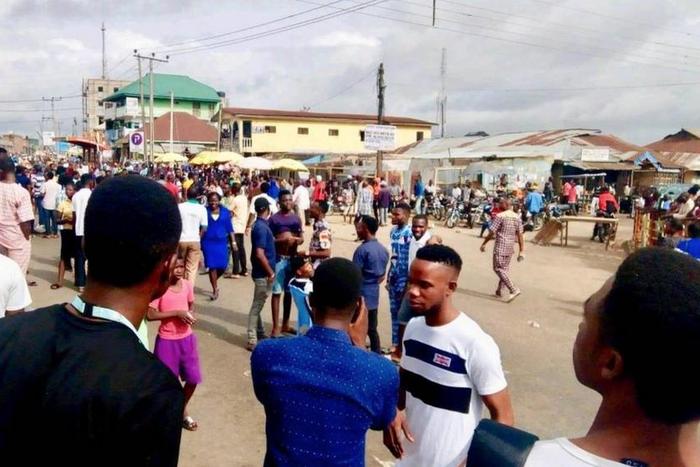 Students of Adekunle Ajasin University protesting over fee hike in Akure on Monday, April 9, 2018.