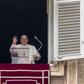Pope Francis delivers his blessing from the window of his studio overlooking St. Peter's Square at the Vatican on January 7, 2024.Andrew Medichini/AP