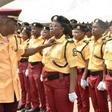 Gov. Babajide Sanwo-Olu of Lagos State adjusting the collar of one of the newly recruited officials of Lagos State Traffic Management Authority (LASTMA) during their passing out parade in Lagos on Wednesday (NAN)