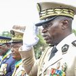 Head of Gabon’s elite Republican Guard, General Brice Oligui Nguema (R), is decorated by Gabon Prime Minister Alain Claude Bilie Bie Nze (L) in Libreville on August 16, 2023 during celebrations ahead of Gabon Independence day celebrated on August 17, 2...