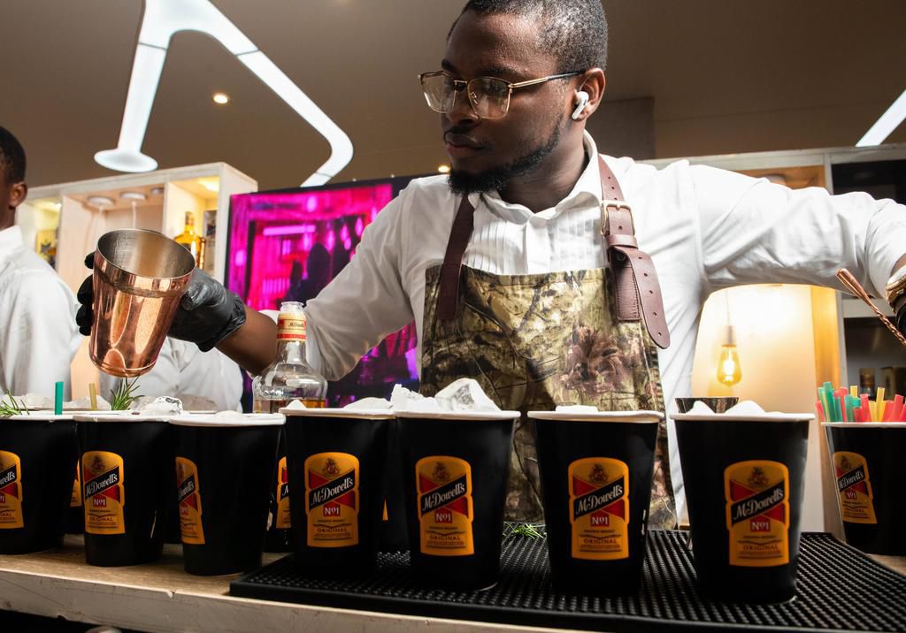 Mr. Dowells refreshes guests at the 2023 Humour Awards