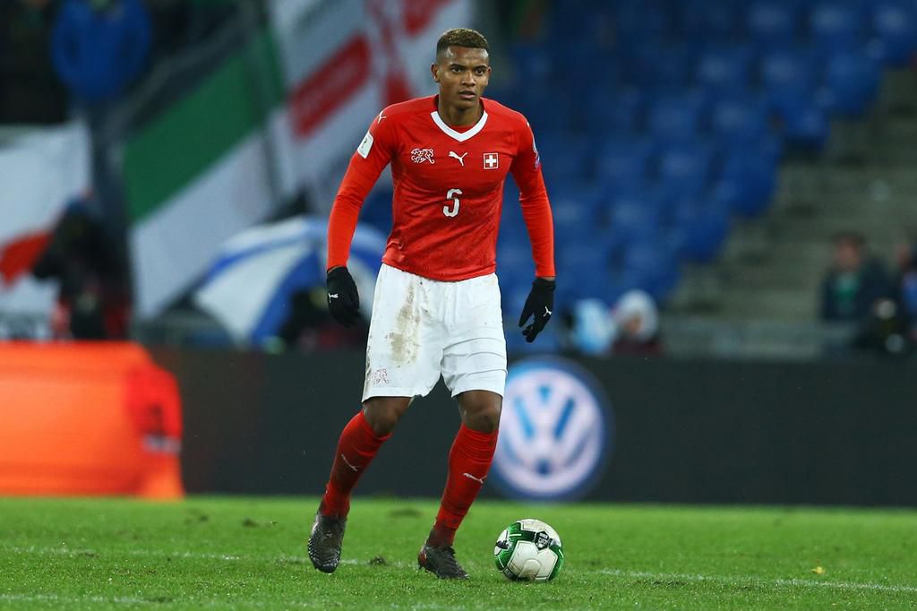 Manchester City's Akanji in action for Switzerland