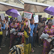 Staff members of PTAD welcomed her back with placards and loud cheers at the entrace of the office buliding.