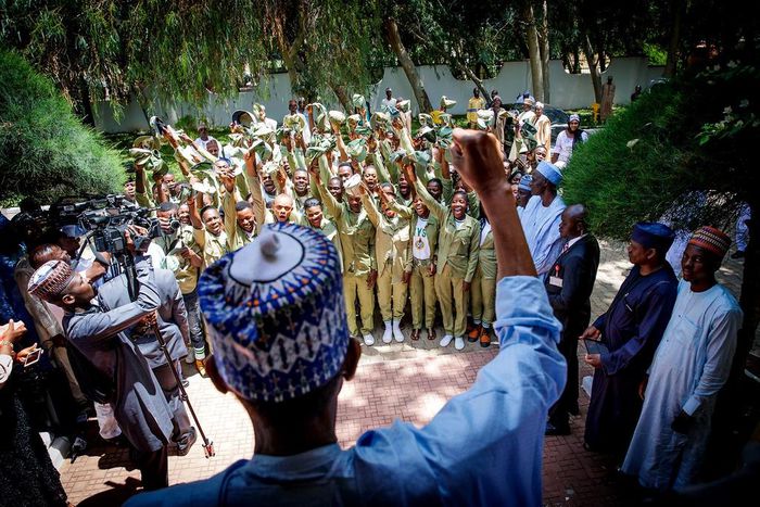 President Muhammadu Buhari with corps members in Daura, Katsina State