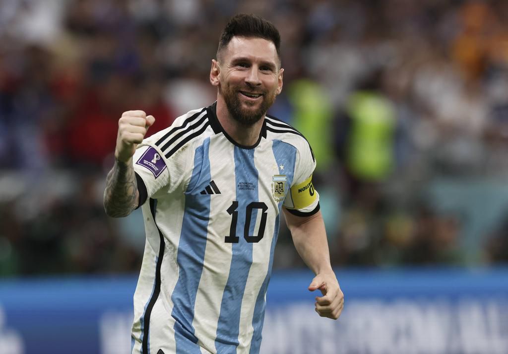 Lionel Messi of Argentina celebrates at full time