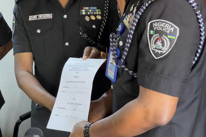 The acting AIG, Abiodun Alabi (right), handing over the Lagos State Police Command to the new commissioner of police, Idowu Owohunwa (left) in Ikeja, Lagos [Twitter/@BenHundeyin]