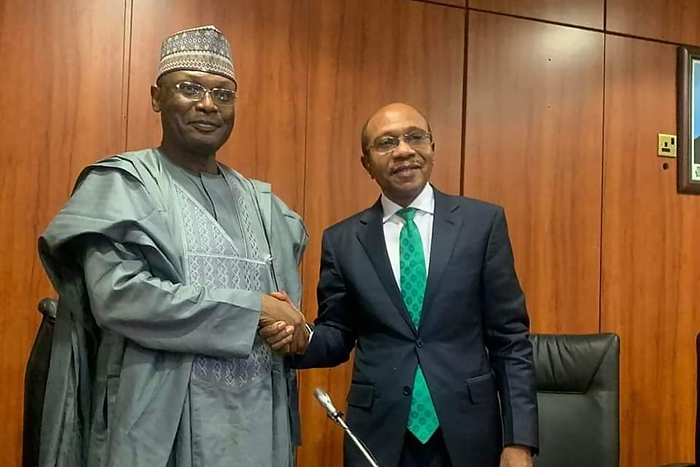 Chairman of the Independent National Electoral Commission, Mahmood Yakubu and Godwin Emefiele, the Governor of the Central Bank of Nigeria. (Leadership)