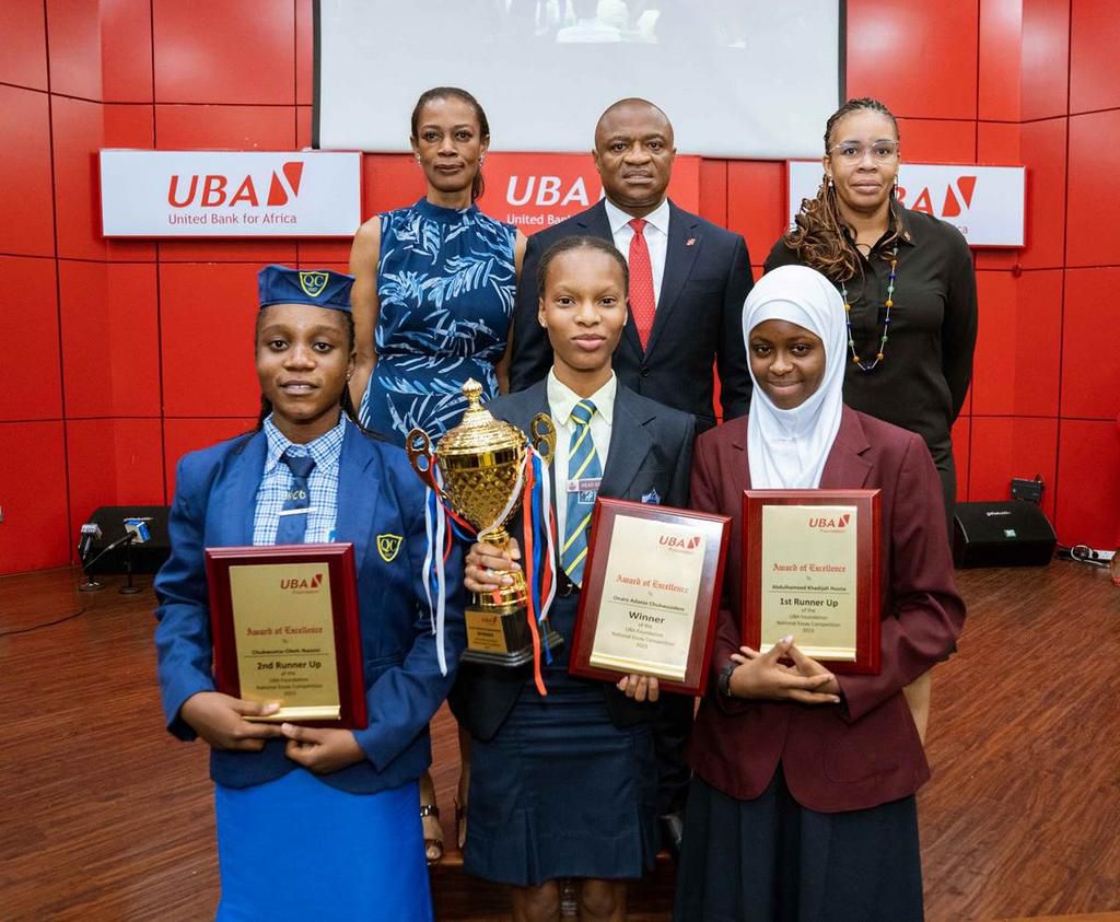 L-R: Managing Director/CEO, United Bank for Africa(UBA) Foundation, Mrs Bola Atta; Group Managing Director/CEO, UBA Plc, Mr. Oliver Alawuba; Group Head, Marketing and Corporate Communications, UBA; 3rd Prize winner, 2023 UBA National Essay Competition ...