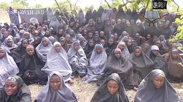 A screen shot of a video showing a number of abducted Chibok schoolgirls