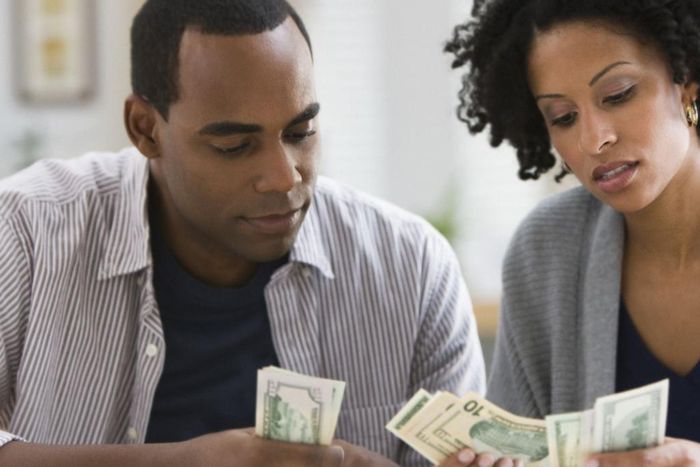 Couple counting money