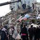 Rescuers and civilians look for survivors under the rubble of collapsed buildings in Kahramanmaras, Turkey. A 7.8-magnitude earthquake struck the country's southeast on February 7, 2023.ADEM ALTAN/AFP via Getty Images