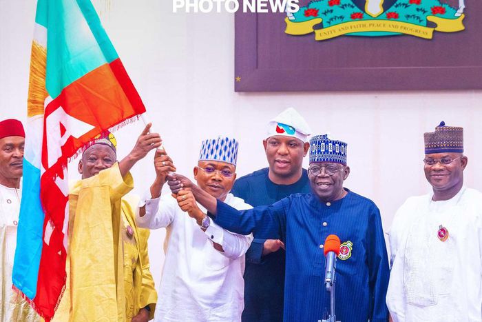 Tinubu presents flags to Uzodimma, Ododo, Sylva ahead of November 11 polls  [Presidency]