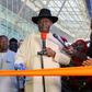 Dr Wale Babalakin cut the ribbon across the entrance of the art gallery at MMA2 on Saturday, May 6, 2023. (Bi-Courtney)