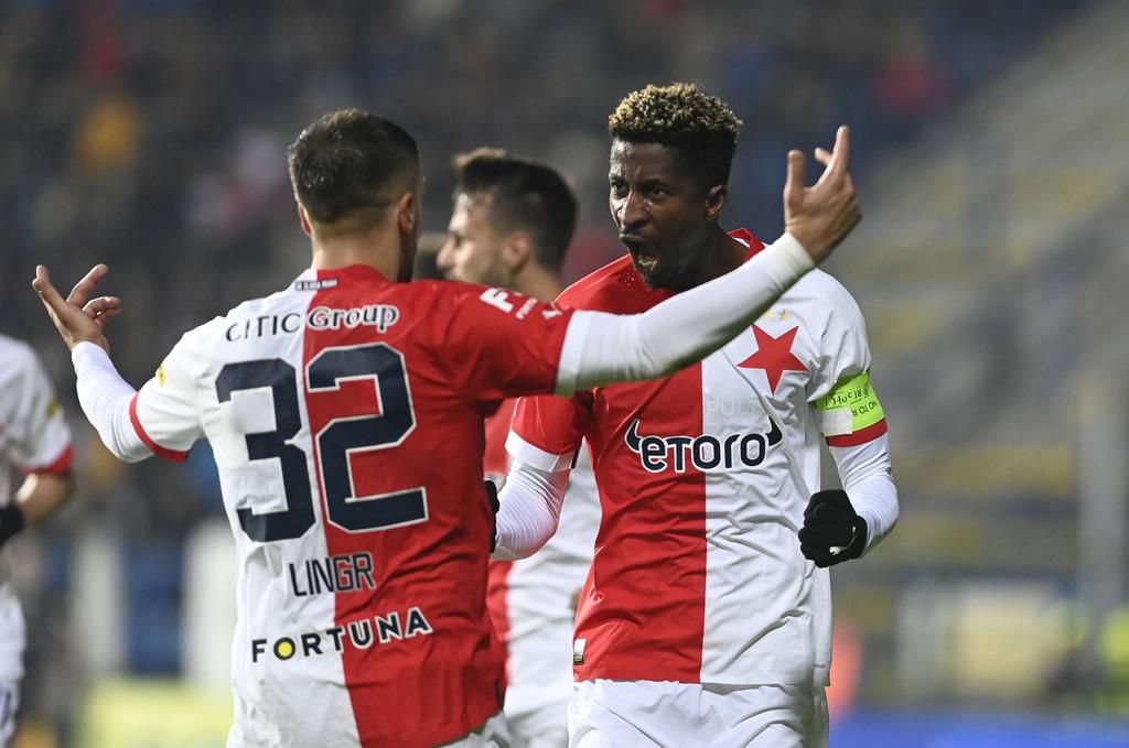 Peter Olayinka celebrates scoring for Slavia Prague