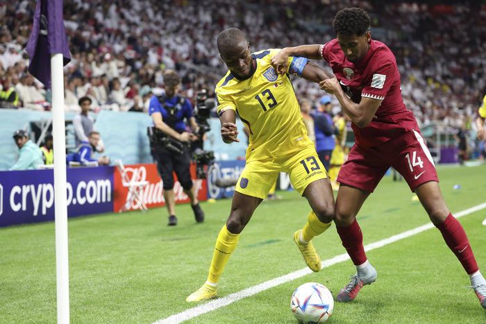 Enner Valencia (L) of Ecuador vies with Homam Ahmed of Qatar during the Group A match between Qatar and Ecuador at the 2022 FIFA World Cup on November 20, 2022.