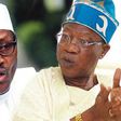 President Muhammadu Buhari and the minister of Information and Culture, Alhaji Lai Mohammed (Herald)