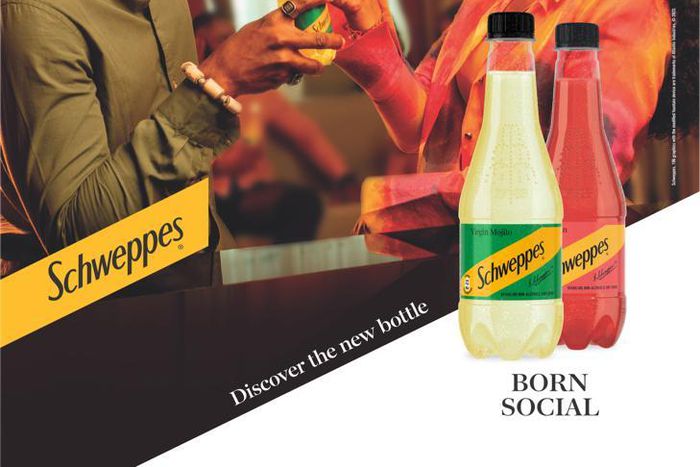 Ebuka and Sharon Ooja with Schweppes bottle