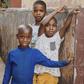 Benji and friends play outside church every sunday [Photographed by Ima Elijah]