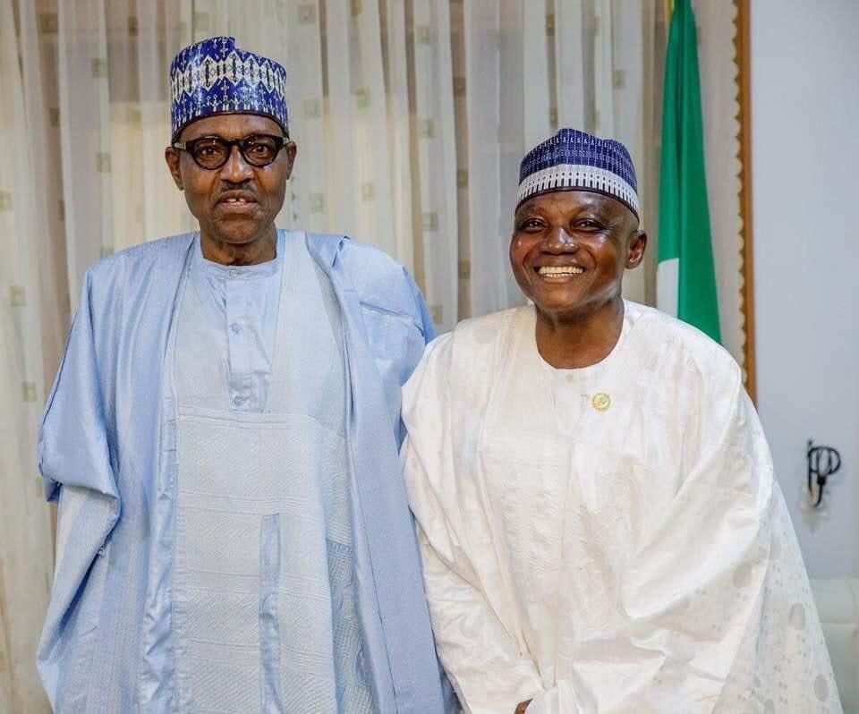 President Muhammadu Buhari felicitates with his Senior Special Assistant on Media and Publicity, Malam Garba Shehu on his 60th birthday. [Twitter/@BashirAhmaad]