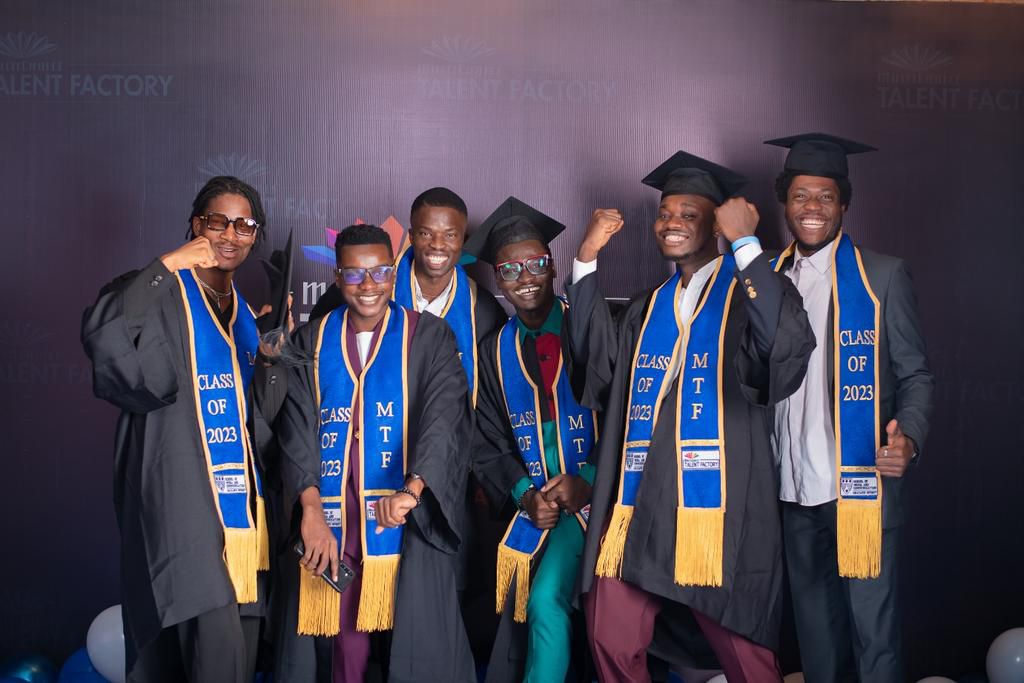 Caption: Samuel Ogundeyi (Left) with some students of the set during the ceremony