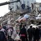 Rescuers and civilians look for survivors under the rubble of collapsed buildings in Kahramanmaras, Turkey. A 7.8-magnitude earthquake struck the country's southeast on February 7, 2023.ADEM ALTAN/AFP via Getty Images