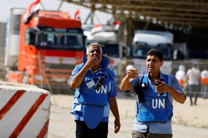 Aid arrives at the Palestinian side of the border with Egypt in Rafah in the southern Gaza Strip, October 21, 2023.Ibraheem Abu Mustafa/Reuters